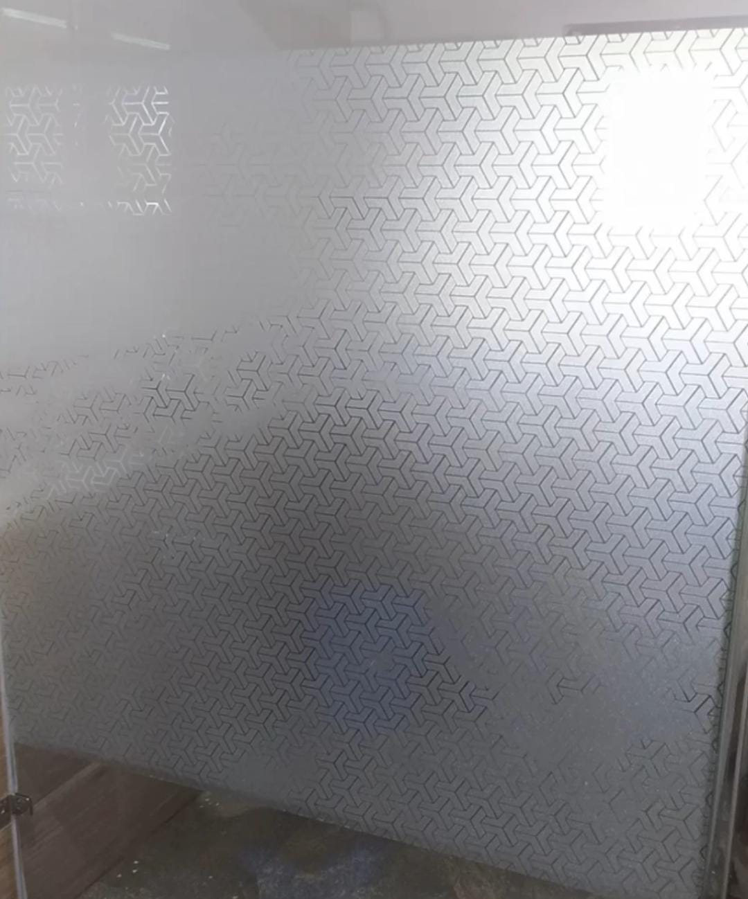 Glass frosting sticker installation by SHWETHA ARTS